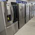 Refrigerators and freezers on display in the showroom